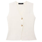 Manelia | Gouden knoop gebreid vest en lange rok