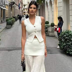 Manelia | Gouden knoop gebreid vest en lange rok