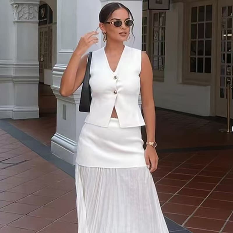 Manelia | Gouden knoop gebreid vest en lange rok